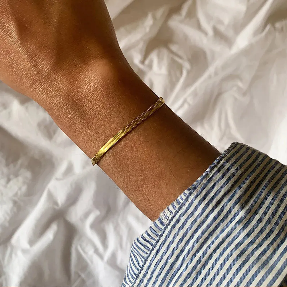 Trending Elegance: Women's Classic Snake Chain Bracelet in Gold Color, available in widths of 3/4/5MM. Crafted from Stainless Steel, this bracelet is a timeless and stylish jewelry gift for women.